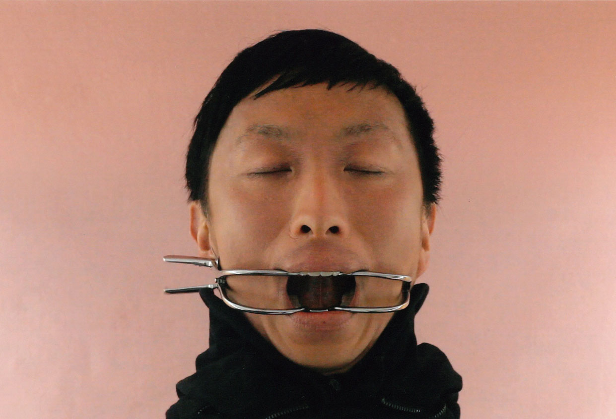 Infinite Love by Mr. Owen Leong (Australia). Medium/Material: HD video. Infinite Love shows the artist with his mouth kept forcibly open with a dental retractor, as a heart made of frozen milk melts and drips whiteness into his open mouth. Visceral, ambiguous and poetic, the transformation of his body through fictional selves opens up a space for new identities to come into being.
